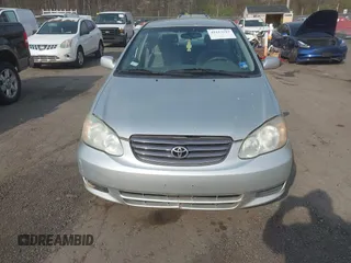 2003 Toyota Corolla CE with VIN JTDBR32E930004139, listed as a IAAI auction lot 42113619 with 209,120 mi miles. Bid and sale history available at carsss.com. Image 6.
