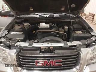 2004 GMC Envoy SLE with VIN 1GKDT13S042243883, listed as a IAAI auction lot 41795335 with 162,873 mi miles. Bid and sale history available at carsss.com. Image 10.