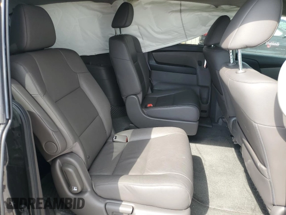 2016 Honda Odyssey Touring Elite с VIN 5FNRL5H99GB090100, выставлен на аукционе Copart как лот 52367795 с пробегом 60 615 миль миль и Списание • Salvage title. История ставок и продаж доступна на DreamBid. Изображение 11.