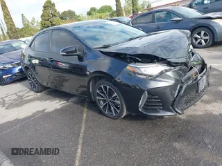 2019 Toyota Corolla L with VIN 5YFBURHE6KP892992, listed as a IAAI auction lot 42057187 with 80,304 mi miles and . Bid and sale history available at DreamBid. Image 1.