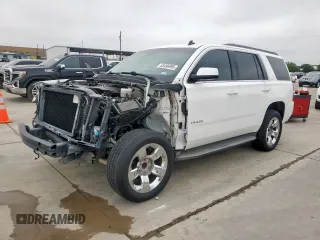 2015 Chevrolet Tahoe LT z VIN 1GNSCBKC0FR210211, wystawiony jako Copart lot #55496995 z przebiegiem 128 296 mil mil oraz Szkoda całkowita • Salvage title. Historia ofert i sprzedaży dostępna na DreamBid. Obrazek 1.