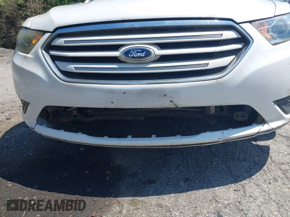 2013 Ford Taurus Limited with VIN 1FAHP2J84DG187311, listed as a IAAI auction lot 42631258 with 112,805 mi miles and . Bid and sale history available at DreamBid. Image 6.