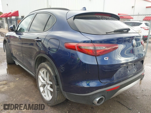 2018 Alfa Romeo Stelvio Sport z VIN ZASFAKPN8J7B82504, wystawiony jako IAAI lot #40811033 z przebiegiem 74 165 mil mil oraz . Historia ofert i sprzedaży dostępna na DreamBid. Obrazek 3.