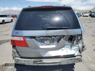 2005 Honda Odyssey Touring z VIN 5FNRL38805B131416, wystawiony jako Copart lot #59157395 z przebiegiem 263 087 mil mil oraz Szkoda całkowita • Salvage title. Historia ofert i sprzedaży dostępna na DreamBid. Obrazek 6.