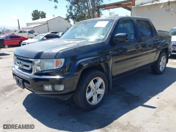 2011 Honda Ridgeline RTL with VIN 5FPYK1F50BB001442, listed as a IAAI auction lot 42023615 with 189,170 mi miles. Bid and sale history available at carsss.com. Image 17.