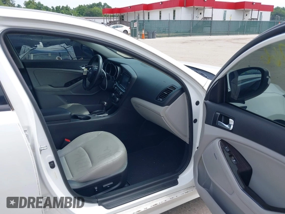2015 Kia Optima EX with VIN 5XXGN4A77FG452747, listed as a IAAI auction lot 42772766 with 97,243 mi miles and . Bid and sale history available at DreamBid. Image 5.
