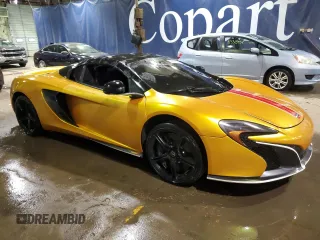 2015 McLaren 650S z VIN SBM11FAA0FW004199, wystawiony jako Copart lot #83836504 z przebiegiem 65 073 mil mil oraz Szkody całkowita. Historia ofert i sprzedaży dostępna na DreamBid. Obrazek 4.