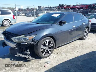 2016 Nissan Maxima SV z VIN 1N4AA6AP3GC383124, wystawiony jako IAAI lot #41821680 z przebiegiem 139 510 mil mil oraz . Historia ofert i sprzedaży dostępna na DreamBid. Obrazek 17.