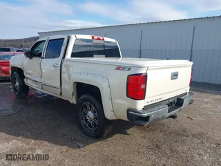 2014 Chevrolet Silverado 1500 LTZ with VIN 3GCUKSEC5EG165684, listed as a IAAI auction lot 41114072 with 133,423 mi miles. Bid and sale history available at carsss.com. Image 3.