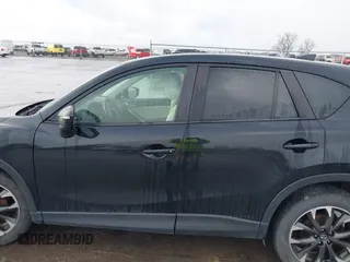 2016 Mazda CX-5 Grand Touring with VIN JM3KE4DY3G0769448, listed as a IAAI auction lot 41947725 with 154,051 mi miles and . Bid and sale history available at carsss.com. Image 14.