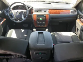 2014 Chevrolet Suburban LS with VIN 1GNSCHE03ER132039, listed as a Copart auction lot 68390234 with 129,744 mi miles and Salvage Title. Bid and sale history available at carsss.com. Image 8.