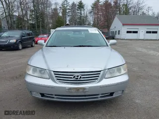 2006 Hyundai Azera SE with VIN KMHFC46F46A077702, listed as a IAAI auction lot 42088782 with 103,033 mi miles. Bid and sale history available at carsss.com. Image 13.