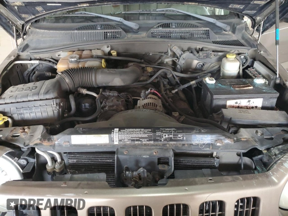 2004 Jeep Liberty Sport with VIN 1J4GL48KX4W115186, listed as a Copart auction lot 49231835 with 206,185 mi miles and Salvage Title. Bid and sale history available at carsss.com. Image 12.