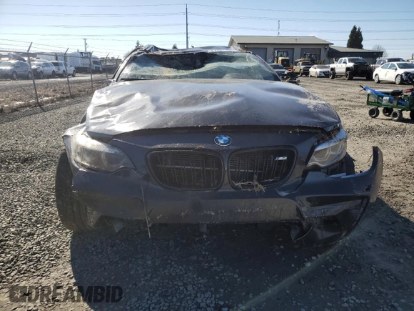 2018 BMW M2 z VIN WBS1J5C53J7B70153, wystawiony jako Copart lot #47081155 z przebiegiem Nie podano mil oraz Szkoda całkowita • Salvage title. Historia ofert i sprzedaży dostępna na DreamBid. Obrazek 5.