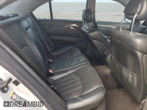 2005 Mercedes-Benz E-Class 5.5L AMG with VIN WDBUF76J05A730404, listed as a Copart auction lot 78168554 with 154,164 mi miles and Clean Title. Bid and sale history available at carsss.com. Image 10.