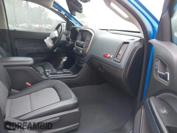 2022 Chevrolet Colorado 4WD Z71 z VIN 1GCGTDEN7N1124379, wystawiony jako IAAI lot #42372796 z przebiegiem 60 943 mil mil oraz . Historia ofert i sprzedaży dostępna na DreamBid. Obrazek 5.