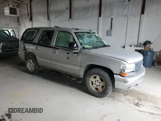 2004 Chevrolet Tahoe LT with VIN 1GNEC13Z14J323770, listed as a Copart auction lot 57846675 with 140,232 mi miles and Salvage title. Bid and sale history available at DreamBid. Image 4.