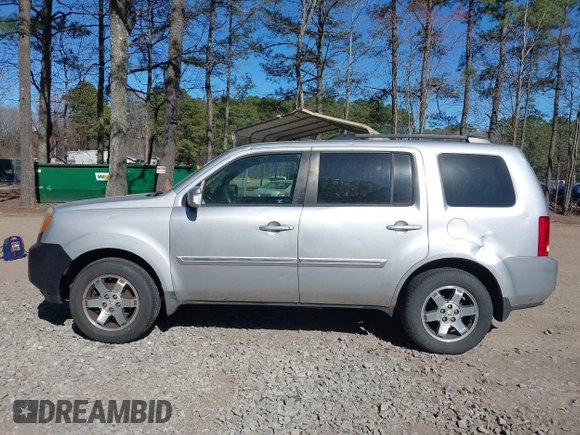 2010 Honda Pilot Touring with VIN 5FNYF4H91AB020868, listed as a IAAI auction lot 41783104 with 298,022 mi miles and . Bid and sale history available at carsss.com. Image 14.