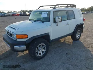2014 Toyota FJ Cruiser with VIN JTEBU4BF1EK183485, listed as a IAAI auction lot 41185853 with 91,293 mi miles. Bid and sale history available at carsss.com. Image 2.