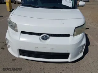 2013 Scion xB with VIN JTLZE4FEXDJ037953, listed as a IAAI auction lot 42002490 with 106,206 mi miles. Bid and sale history available at carsss.com. Image 12.