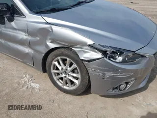 2015 Mazda 3 i Touring with VIN 3MZBM1L77FM138326, listed as a IAAI auction lot 41839685 with 97,506 mi miles and . Bid and sale history available at carsss.com. Image 6.