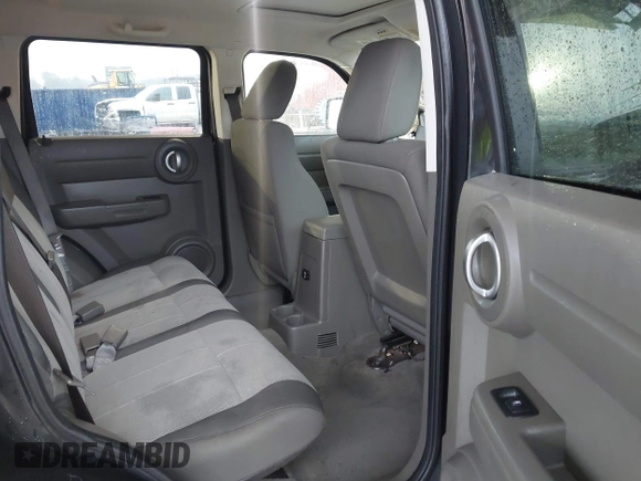 2007 Dodge Nitro SXT with VIN 1D8GT28K67W683600, listed as a IAAI auction lot 40958011 with 70,141 mi miles. Bid and sale history available at carsss.com. Image 8.