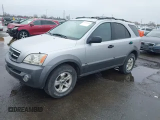 2004 Kia Sorento LX with VIN KNDJC733945239632, listed as a IAAI auction lot 41094685 with 150,838 mi miles. Bid and sale history available at carsss.com. Image 2.