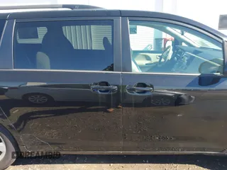 2012 Toyota Sienna LE AAS with VIN 5TDKK3DC3CS263240, listed as a IAAI auction lot 41810686 with 232,026 mi miles. Bid and sale history available at carsss.com. Image 13.