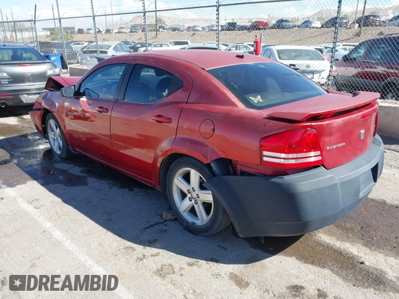 2008 Dodge Avenger SXT with VIN 1B3LC56R98N169618, listed as a IAAI auction lot 40626545 with 153,921 mi miles. Bid and sale history available at carsss.com. Image 3.