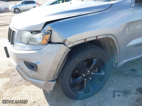 2015 Jeep Grand Cherokee Altitude with VIN 1C4RJFAG3FC210151, listed as a IAAI auction lot 41865151 with 122,579 mi miles. Bid and sale history available at carsss.com. Image 6.