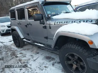 2015 Jeep Wrangler Unlimited Rubicon Hard Rock with VIN 1C4HJWFG1FL659803, listed as a IAAI auction lot 41172485 with 126,881 mi miles and . Bid and sale history available at DreamBid. Image 13.