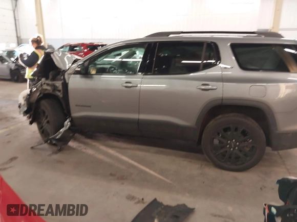 2023 GMC Acadia SLT with VIN 1GKKNULS7PZ133802, listed as a IAAI auction lot 41266532 with 22,214 mi miles and . Bid and sale history available at DreamBid. Image 15.