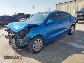 2023 Kia Rio LX z VIN 3KPA24AD2PE597810, wystawiony jako Copart lot #53565235 z przebiegiem 6 836 mil mil oraz Szkoda całkowita • Salvage title. Historia ofert i sprzedaży dostępna na DreamBid. Obrazek 1.