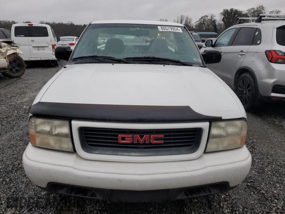 2001 GMC Sonoma SL with VIN 1GTCS145418119062, listed as a Copart auction lot 80579954 with 76,295 mi miles and Salvage Title. Bid and sale history available at carsss.com. Image 5.