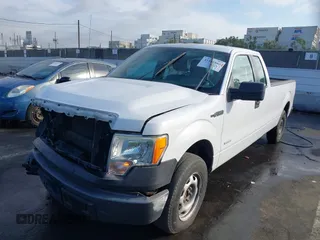 2014 Ford F-150 XL with VIN 1FTFX1CTXEKE24914, listed as a IAAI auction lot 41426666 with 141,451 mi miles. Bid and sale history available at carsss.com. Image 2.