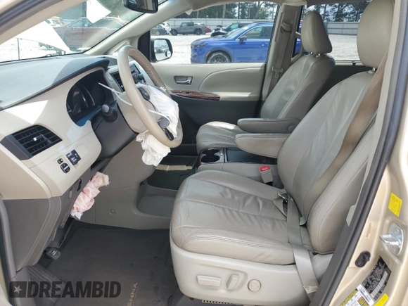 2011 Toyota Sienna XLE AAS с VIN 5TDYK3DC8BS106182, выставлен на аукционе Copart как лот 57728465 с пробегом 168 468 миль миль и Списание • Salvage title. История ставок и продаж доступна на DreamBid. Изображение 7.