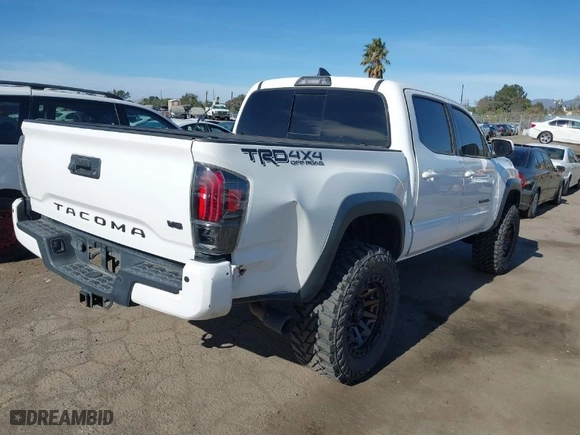 2019 Toyota Tacoma 4WD SR with VIN 3TMCZ5AN3KM277204, listed as a IAAI auction lot 41278640 with 78,930 mi miles. Bid and sale history available at carsss.com. Image 4.