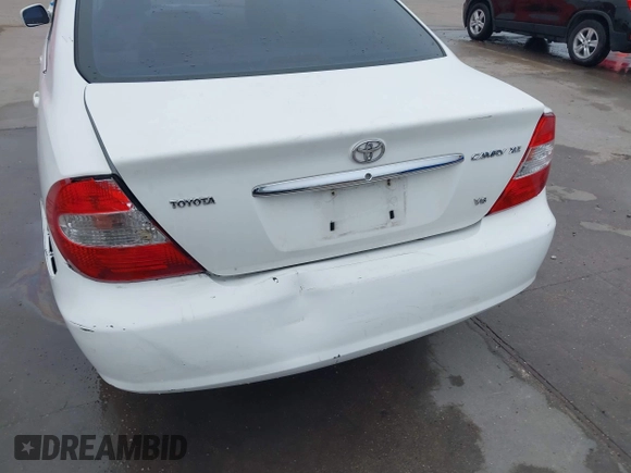 2003 Toyota Camry LE z VIN JTDBF30K530148403, wystawiony jako IAAI lot #41688346 z przebiegiem 299 143 mil mil oraz . Historia ofert i sprzedaży dostępna na DreamBid. Obrazek 6.