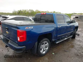 2016 Chevrolet Silverado 1500 LTZ with VIN 3GCUKSEC9GG291579, listed as a IAAI auction lot 41978243 with 112,278 mi miles. Bid and sale history available at carsss.com. Image 4.