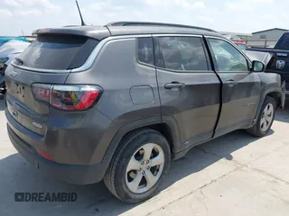 2021 Jeep Compass Latitude with VIN 3C4NJCBBXMT563858, listed as a IAAI auction lot 42327326 with Not provided miles and . Bid and sale history available at DreamBid. Image 4.