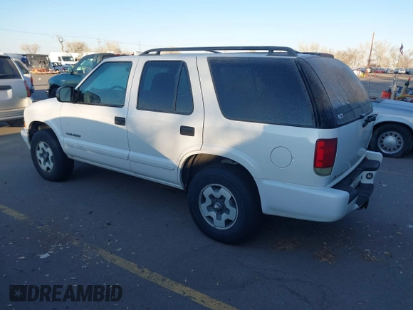 2004 Chevrolet Blazer LS z VIN 1GNDT13X34K161001, wystawiony jako IAAI lot #41432856 z przebiegiem Nie podano mil oraz . Historia ofert i sprzedaży dostępna na DreamBid. Obrazek 3.