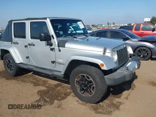 2012 Jeep Wrangler Unlimited Sahara with VIN 1C4BJWEG3CL269238, listed as a IAAI auction lot 42599010 with 122,121 mi miles and . Bid and sale history available at DreamBid. Image 1.