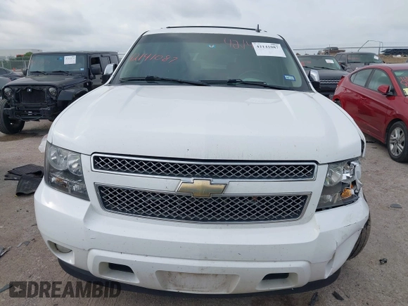 2011 Chevrolet Suburban LT with VIN 1GNSCJE05BR392834, listed as a IAAI auction lot 42141087 with 251,359 mi miles and . Bid and sale history available at DreamBid. Image 12.