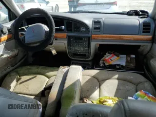 1998 Lincoln Continental with VIN 1LNFM97V5WY637895, listed as a Copart auction lot 77020154 with 0 mi miles and Salvage Title. Bid and sale history available at carsss.com. Image 8.