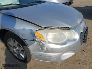 2004 Chrysler Sebring LXi with VIN 1C3EL55R54N239266, listed as a IAAI auction lot 41792875 with 76,712 mi miles. Bid and sale history available at carsss.com. Image 6.