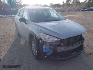 2015 Mazda CX-5 Touring with VIN JM3KE4CY3F0510846, listed as a IAAI auction lot 41280516 with 118,504 mi miles. Bid and sale history available at carsss.com. Image 1.