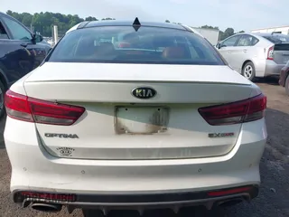2017 Kia Optima SX z VIN 5XXGW4L26HG125516, wystawiony jako IAAI lot #42483007 z przebiegiem 152 400 mil mil oraz . Historia ofert i sprzedaży dostępna na DreamBid. Obrazek 16.