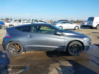 2015 Honda CR-Z EX with VIN JHMZF1C62FS002209, listed as a IAAI auction lot 41291326 with 73,301 mi miles and . Bid and sale history available at DreamBid. Image 14.