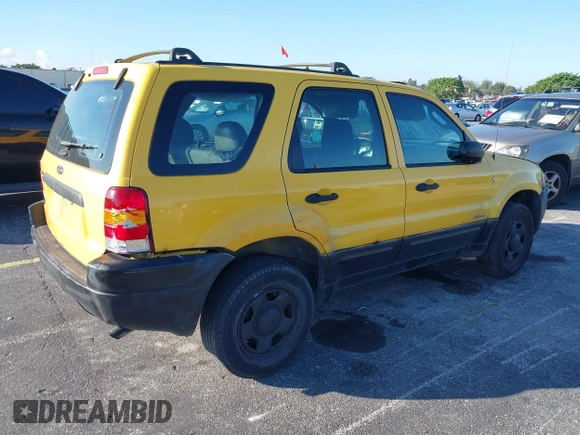 2002 Ford Escape XLS Choice with VIN 1FMYU01132KD56671, listed as a IAAI auction lot 41552541 with 245,923 mi miles and . Bid and sale history available at DreamBid. Image 4.