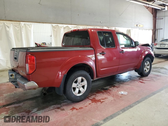 2011 Nissan Frontier Pro-4X with VIN 1N6AD0EV2BC400945, listed as a Copart auction lot 58693635 with 122,209 mi miles and Salvage title. Bid and sale history available at DreamBid. Image 3.